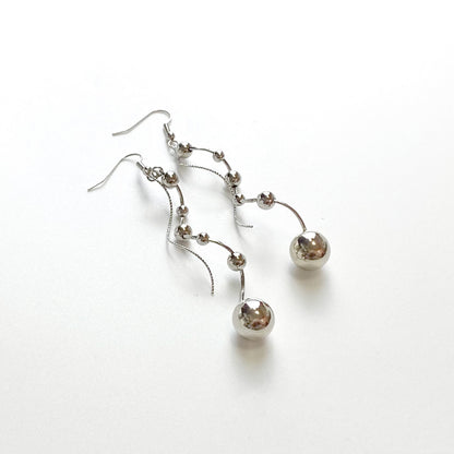 シルバースパイラル ピアス_1